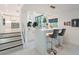Contemporary bar area with marble countertops and stylish seating at 4748 E Redfield Rd, Phoenix, AZ 85032