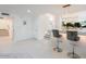 Modern bar area with marble countertops and sleek bar stools at 4748 E Redfield Rd, Phoenix, AZ 85032