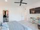 Bright bedroom with a large closet, and a comfortable area at 4748 E Redfield Rd, Phoenix, AZ 85032