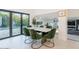 Modern dining area with stylish furniture and a bright, open layout at 4748 E Redfield Rd, Phoenix, AZ 85032