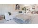 Spacious living area featuring a comfortable white sofa, chic coffee table, and stylish decor at 4748 E Redfield Rd, Phoenix, AZ 85032