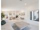 Open-concept living space with modern furnishings, lots of natural light, and neutral decor at 4748 E Redfield Rd, Phoenix, AZ 85032