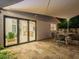 Seamless indoor-outdoor living with a covered patio and dining area, ideal for relaxing and entertaining at 4748 E Redfield Rd, Phoenix, AZ 85032