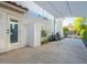 Covered patio with a door to the home, storage shed, and a built in sun shade with a fenced-in yard at 4748 E Redfield Rd, Phoenix, AZ 85032