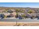 Inviting single-Gathering homes line a quiet street with desert landscaping and mountain views at 48069 N Rico Way, Gold Canyon, AZ 85118