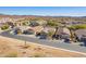 Charming single-Gathering homes line a quiet street with desert landscaping and mountain views at 48069 N Rico Way, Gold Canyon, AZ 85118