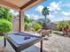 Outdoor space featuring a pool table and an entertainment area with lush landscaping at 4935 W Lariat Ln, Phoenix, AZ 85083