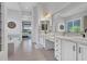 Bright bathroom features dual sinks, vanity, soaking tub, and modern finishes at 4935 W Lariat Ln, Phoenix, AZ 85083