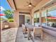 Relaxing covered patio with ample seating and outdoor cooking area at 4935 W Lariat Ln, Phoenix, AZ 85083