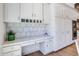 Built-in desk area in white offers ample storage and stylish design at 4935 W Lariat Ln, Phoenix, AZ 85083