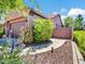 Charming home exterior with a two-car garage and well-maintained landscaping at 4935 W Lariat Ln, Phoenix, AZ 85083