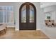 Inviting foyer featuring hardwood floors, decorative front doors and plenty of natural light at 4935 W Lariat Ln, Phoenix, AZ 85083