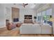 Bright living room with high ceilings, fireplace, and ample natural light at 4935 W Lariat Ln, Phoenix, AZ 85083