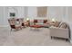 Inviting living room with neutral-toned sofas and chairs arranged on a plush carpet at 4935 W Lariat Ln, Phoenix, AZ 85083