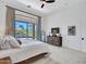 Bright main bedroom with a large window overlooking the backyard at 4935 W Lariat Ln, Phoenix, AZ 85083