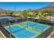 Community pickleball courts featuring multiple well-maintained courts with mountain views in the distance at 4935 W Lariat Ln, Phoenix, AZ 85083