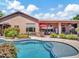 Inviting backyard pool with patio, outdoor kitchen and covered seating area perfect for entertaining at 4935 W Lariat Ln, Phoenix, AZ 85083