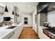 Contemporary kitchen with stainless steel appliances, sleek cabinetry, and hardwood floors at 5455 E Lincoln Dr # 3006, Paradise Valley, AZ 85253