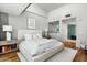 Spacious main bedroom featuring hardwood floors, large windows, and ensuite bathroom with marble at 5455 E Lincoln Dr # 3006, Paradise Valley, AZ 85253