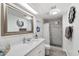 Modern bathroom with a vanity, spacious shower, and stylish fixtures at 5534 E Player Pl, Mesa, AZ 85215