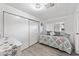Comfortable bedroom with a daybed, closet space, and a serene ambiance at 5534 E Player Pl, Mesa, AZ 85215
