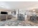 Open concept living space features a flowing floor plan with kitchen access at 5534 E Player Pl, Mesa, AZ 85215