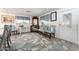 Cozy living room featuring stylish furniture, decorative rug, and ample natural light at 5534 E Player Pl, Mesa, AZ 85215
