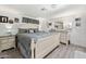 Serene bedroom with a large bed, elegant decor, and abundant natural light at 5534 E Player Pl, Mesa, AZ 85215