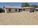 Front exterior showing charming single-story home, desert landscape, and inviting curb appeal at 5608 W Carol Ave, Glendale, AZ 85302