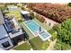 Aerial view of the property featuring a backyard pool, waterfall, and pristine landscaping at 6196 E Calle Camelia --, Scottsdale, AZ 85251