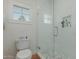 Bathroom with glass-enclosed shower featuring white subway tile and a built in shelf at 6196 E Calle Camelia --, Scottsdale, AZ 85251