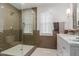 Modern bathroom with a glass-enclosed shower and elegant fixtures at 6196 E Calle Camelia --, Scottsdale, AZ 85251