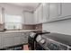 Well-equipped laundry room with modern appliances and stylish cabinetry at 6196 E Calle Camelia --, Scottsdale, AZ 85251