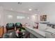 Bright living room featuring comfortable seating, stylish decor, and hardwood floors at 6196 E Calle Camelia --, Scottsdale, AZ 85251