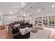 Bright and airy living space, complete with a stylish sofa, modern decor, and an open-concept design at 6196 E Calle Camelia --, Scottsdale, AZ 85251