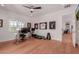 Home office featuring sleek furniture, sporty decorations, and ample workspace at 6196 E Calle Camelia --, Scottsdale, AZ 85251