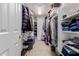 Walk in closet with open shelves perfect for all storage needs at 6276 N 75Th Ln, Glendale, AZ 85303