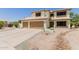 Charming two-story home with desert landscaping and spacious driveway at 6276 N 75Th Ln, Glendale, AZ 85303