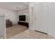 Bright entryway with tile flooring, white door and cozy living room at 6276 N 75Th Ln, Glendale, AZ 85303