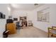 Bright home office featuring desk, shelving, and neutral color palette for work or study at 6276 N 75Th Ln, Glendale, AZ 85303