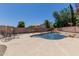 Private backyard oasis with a freeform pool, rock accents, and ample seating at 6276 N 75Th Ln, Glendale, AZ 85303