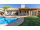 Inviting backyard pool and patio area, perfect for entertaining and relaxing outdoors at 6430 E Riverdale St, Mesa, AZ 85215