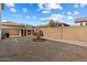 Well-maintained backyard with a shed, rock landscaping and block wall fence at 7500 E Deer Valley Rd # 54, Scottsdale, AZ 85255