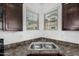 Close-up of the kitchen sink and countertop area at 7732 W Bonitos Dr, Phoenix, AZ 85035