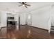 Spacious living room featuring hardwood floors, and an open-concept design at 7732 W Bonitos Dr, Phoenix, AZ 85035
