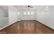 Bright living room with hardwood floors, and neutral walls at 7732 W Bonitos Dr, Phoenix, AZ 85035