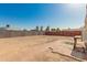 Extensive backyard offering brick accents, potential for gardening, and privacy with varied fencing options at 7849 E Golf Ave, Mesa, AZ 85209