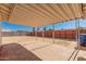 Backyard with covered patio and brick-paved area, perfect for outdoor relaxation and entertaining at 7849 E Golf Ave, Mesa, AZ 85209