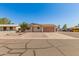 Charming single-story home with gravel landscaping and a quaint front entrance at 7849 E Golf Ave, Mesa, AZ 85209