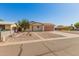Delightful one-story home featuring low maintenance landscaping and a cozy entrance at 7849 E Golf Ave, Mesa, AZ 85209